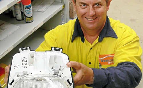 Essential Energy regional stores officer Kevin Schaefer with one of the new energy-efficient 42 watt compact fluorescent lamps, installed across the Tweed, estimated to halve energy consumption. Essential Energy regional stores officer Kevin Schaefer with one of the new energy-efficient 42 watt compact fluorescent lamps, installed across the Tweed, estimated to halve energy consumption.